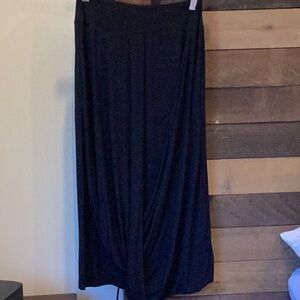 Ronen Chen Black pull on drop waist, drape front skirt in size 4.